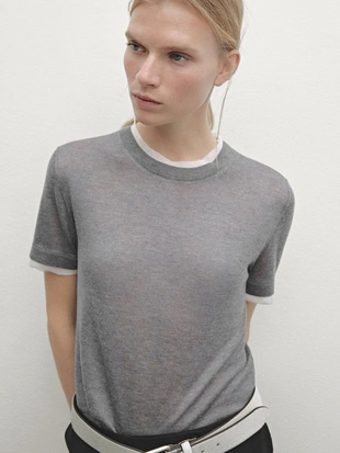 Вязаный свитер с короткими рукавами и потертыми деталями- Заказать в России