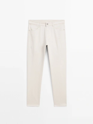 Джинсовые брюки зауженного кроя из хлопчатобумажной смеси- Заказать в России