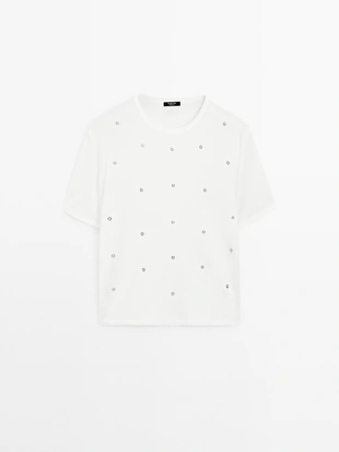 Широкая футболка с деталями люверсов- Заказать в России