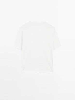 Широкая футболка с деталями люверсов- Заказать в России