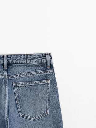 Джинсы с широкими штанинами и средней посадкой- Заказать в России