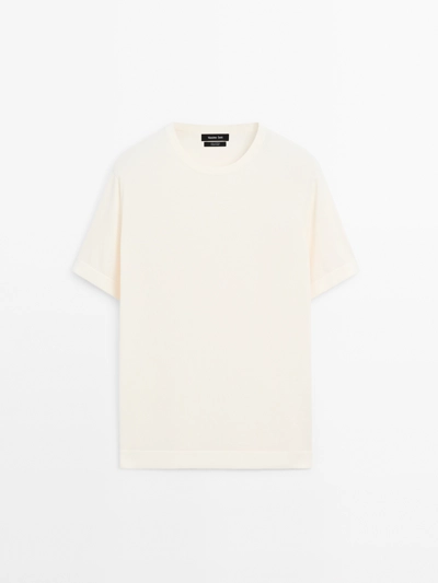 100% COTTON SHORT SLEEVE KNIT SWEATER