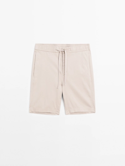COTTON AND LINEN BLEND DRAWSTRING BERMUDA SHORTS