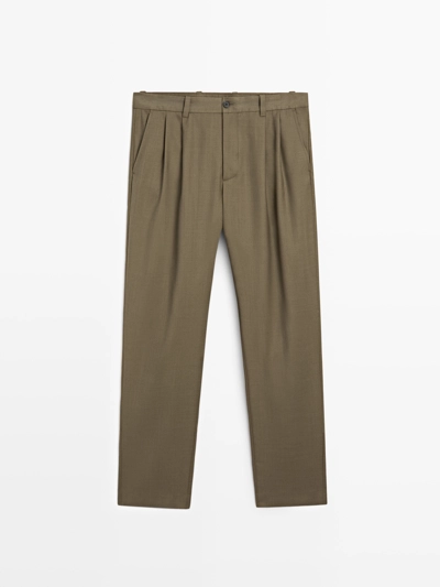 Брюки свободного кроя из шерстяной смеси с защипами