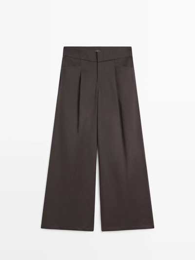 Широкие брюки с защипами- Заказать в России