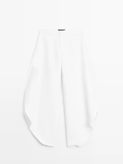 Брюки с разрезом по низу- Заказать в России