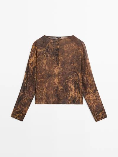 Блузка с принтом и плиссировкой