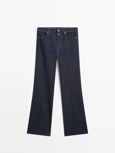 Джинсы с высокой посадкой и расклешенным кроем- Заказать в России