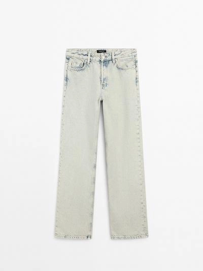 Джинсы с широкими штанинами и средней посадкой- Заказать в России