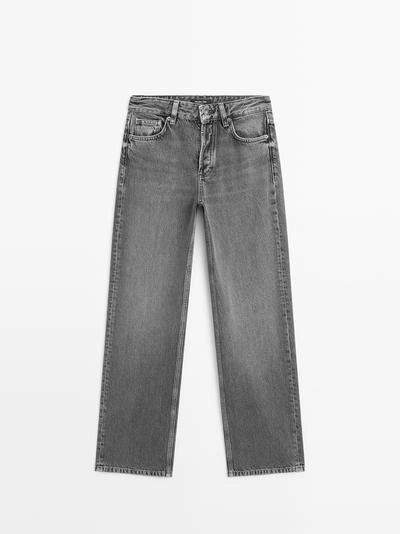 Джинсы с широкими штанинами и средней посадкой- Заказать в России