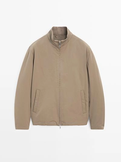 Пуховик с водоотталкивающей пропиткой и высоким воротником- Заказать в России