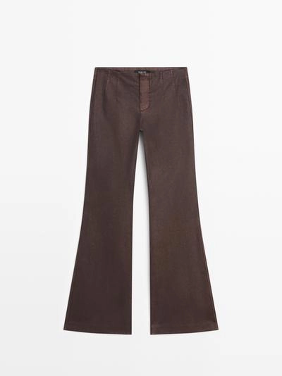 Брюки с расклешенным низом- Заказать в России