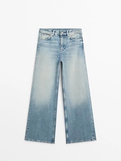 Джинсы с высокой посадкой и широкими брючинами- Заказать в России