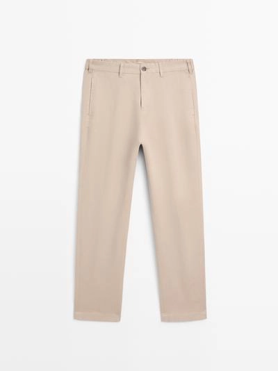 Брюки из хлопкового смесового материала в зауженном крое