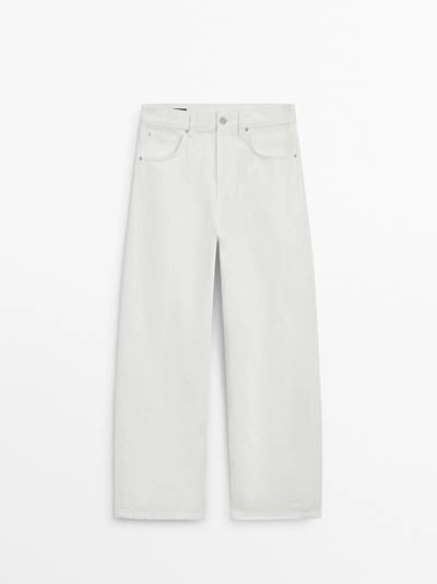 Джинсы с завышенной талией и свободным кроем- Заказать в России