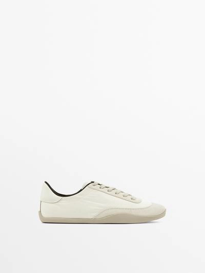 Кроссовки с контрастной отделкой