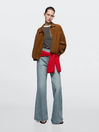 Джинсы с высокой талией и разрезом внизу