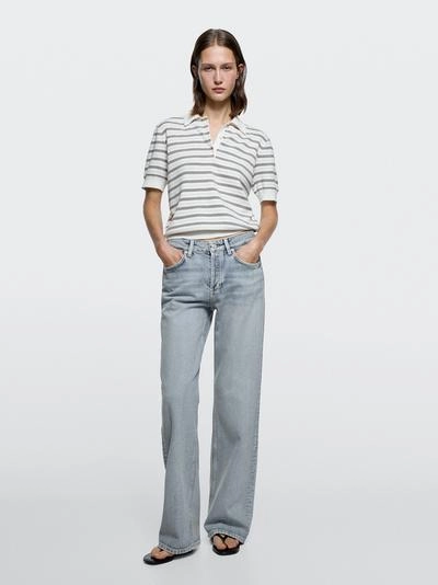 Джинсы с широкими штанинами на средней талии- Заказать в России