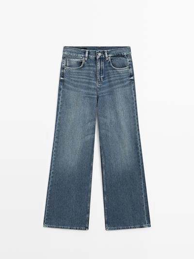 Джинсы с высокой талией и широкими брючинами- Заказать в России