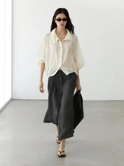 Брюки из меланжевого льна с защипами- Заказать в России