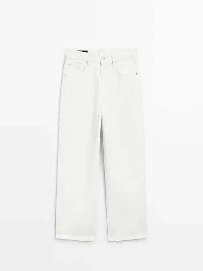 Джинсы с завышенной талией и широкими укороченными брючинами- Заказать в России