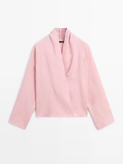 Блузка из льна свободного покроя с завязками