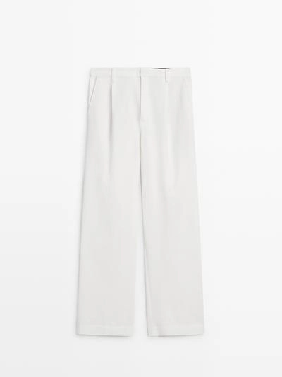 Хлопковые брюки с защипами- Заказать в России