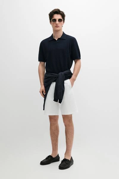 Поло с v-образным вырезом и косым плетением