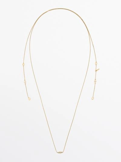 Ожерелье с разнонаправленными элементами- Заказать в России