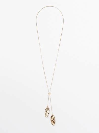 Ожерелье с регулируемым замком и рельефными элементами