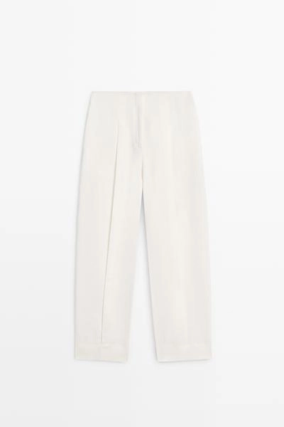 Брюки из льна с драпировкой и манжетами на резинке- Заказать в России