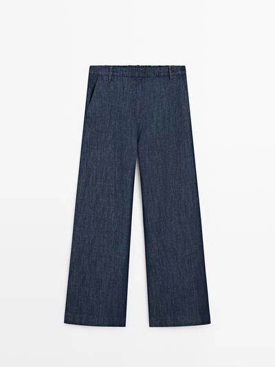 Джинсовые брюки широкого кроя