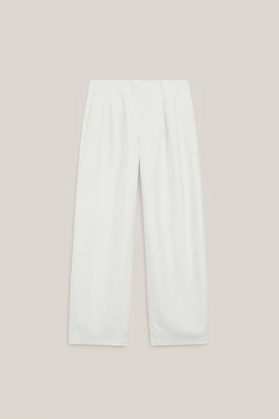 Брюки из льняной смеси с защипами - лимитированная коллекция- Заказать в России