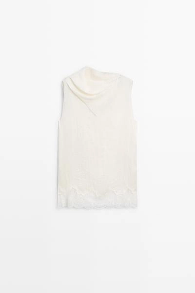 Asymmetric neck top with lace detail
