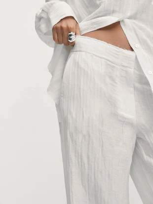 Облегающие брюки с эффектом морщин- Заказать в России