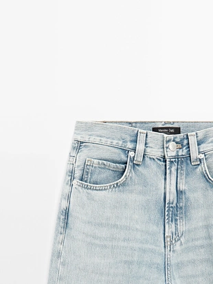 Джинсы с широкими штанинами и высокой талией- Заказать в России