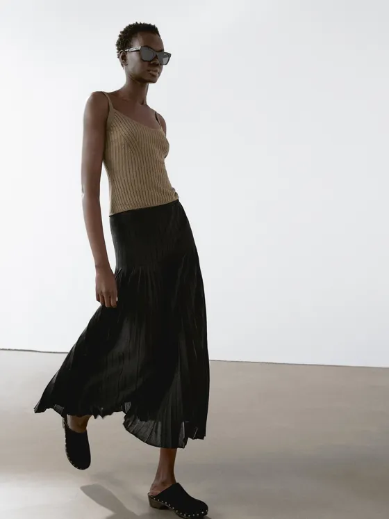 Прозрачная плиссированная юбка миди