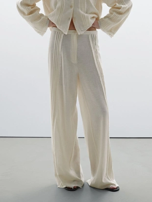 Брюки из хлопчатобумажной смеси с вышитыми деталями- Заказать в России