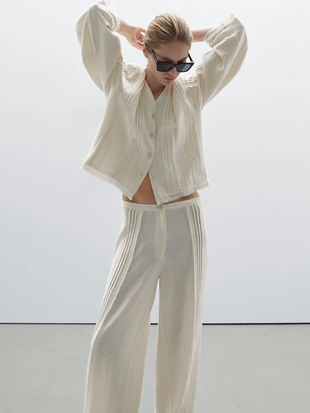 Брюки из хлопчатобумажной смеси с вышитыми деталями- Заказать в России