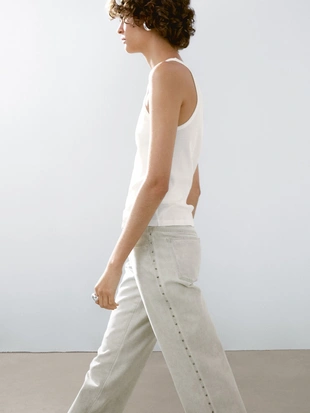 Брюки прямого кроя с заклепками- Заказать в России