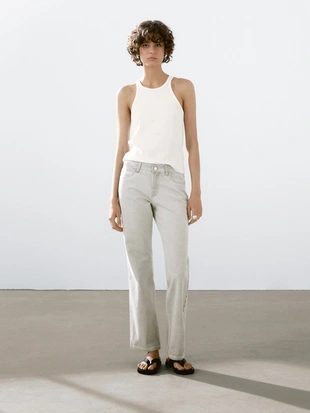 Брюки прямого кроя с заклепками- Заказать в России