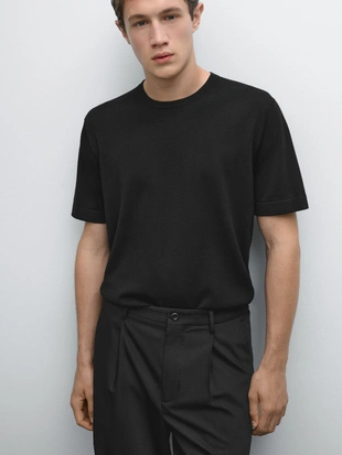 Брюки свободного кроя с деталями втачных складок- Заказать в России