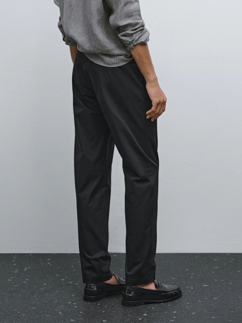 Хлопковые брюки в зауженном крое из смеси тканей