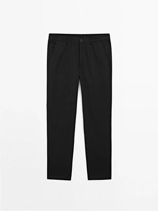 Хлопковые брюки в зауженном крое из смеси тканей- Заказать в России