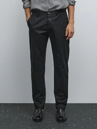 Хлопковые брюки в зауженном крое из смеси тканей- Заказать в России