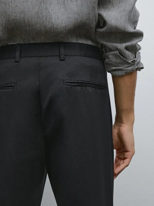 Хлопковые брюки в зауженном крое из смеси тканей- Заказать в России