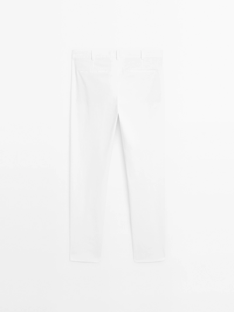 Брюки slim fit
