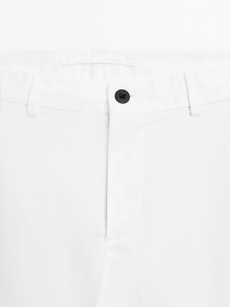 Брюки slim fit