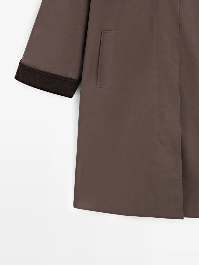 Длинная парка с вощеным покрытием и деталями из бархата