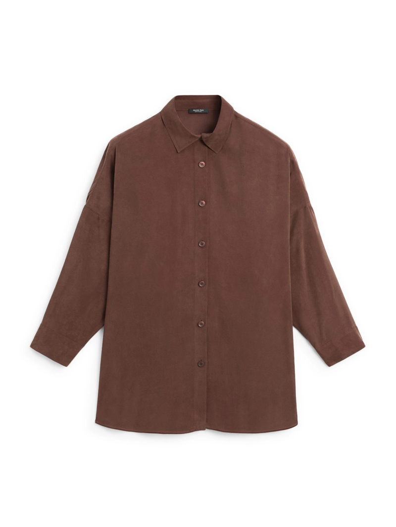 Длинная блузка с плавными линиями